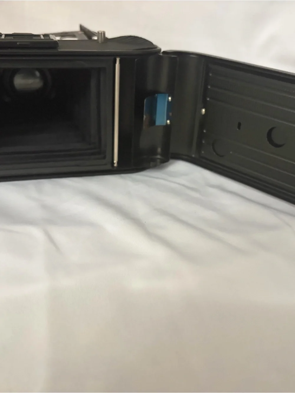 Black Folding Bellows Film Camera with Silver Lens Assembly